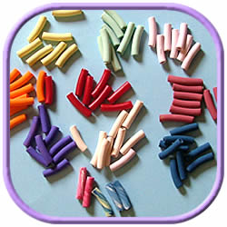 pasta beads painted in different colors