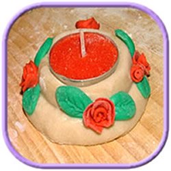 salt dough roses on candle holder